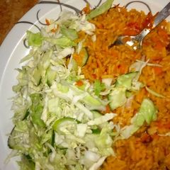 A picture of Jolof rice and veges.