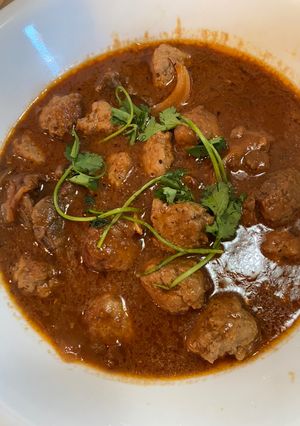 A picture of Chicken Meatballs with Tomato Sauce.