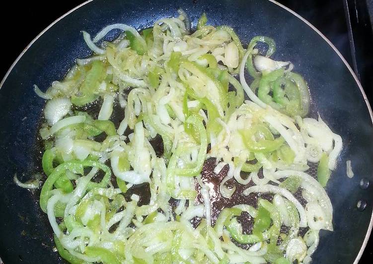 Sauteed onions and green peppers with hamburger meat or hot dogs