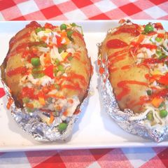 A picture of Baked potatoes KumpirTurkish style.
