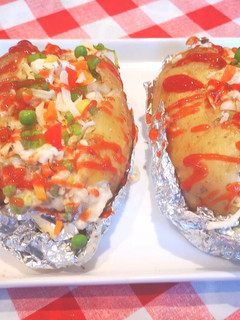 A picture of Baked potatoes KumpirTurkish style.