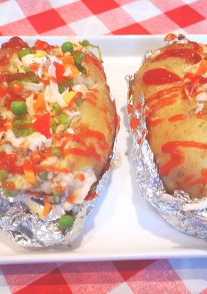 A picture of Baked potatoes KumpirTurkish style.