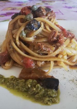 A picture of Linguine with Cherry Tomatoes, Olives, Capers, Sun-Dried Tomatoes, and Pesto.