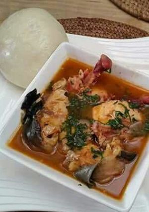 A picture of Utazi soup with fufu.