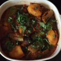 Turia bateta nu bharelu shak. (stuffed ridge gourd and potatoes) A picture of Turia bateta nu bharelu shak. (stuffed ridge gourd and potatoes).