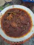 Aloo mater beh palak Gosht