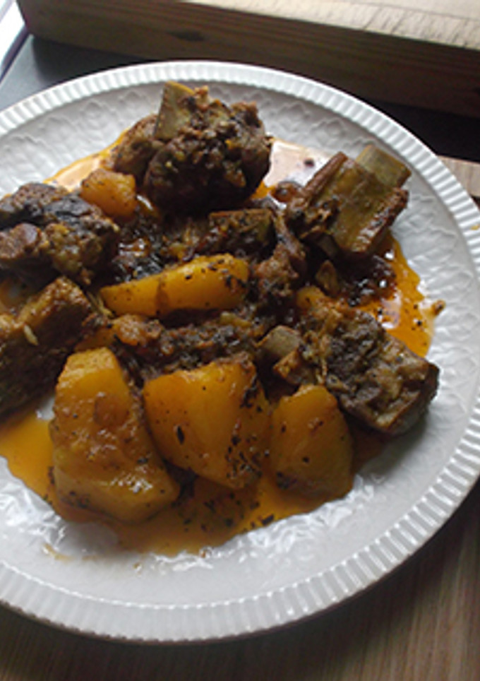 Una foto de Costillas con patatas