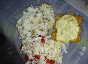 Foto principal de Bastones de merluza a la fugazeta con arroz