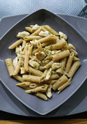A picture of Pasta with Pesto and Chicken.
