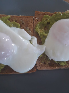 A picture of Smashed avocado and poached egg on toast.
