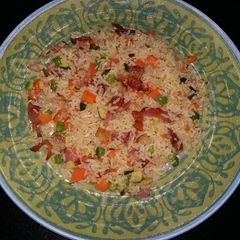A picture of Bacon and vegetable stir fried Rice.