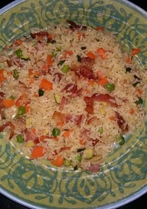 A picture of Bacon and vegetable stir fried Rice.