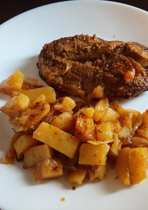 Una foto de Chuletas de cordero con patatas al horno