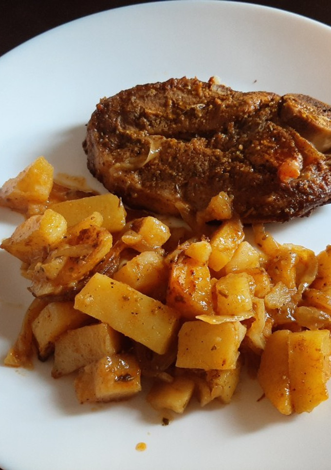 Una foto de Chuletas de cordero con patatas al horno
