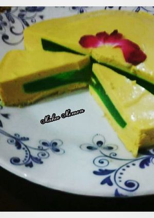 A picture of Surprise mango mousse desert cake.