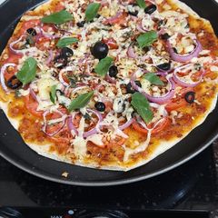 A picture of Italian thin crust pizza.