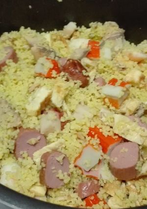 Foto principal de Couscous al curry con salchichas