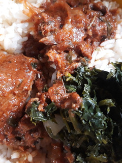 A picture of Rice with vegetable stew.