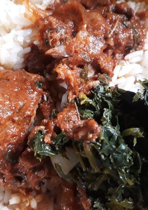 A picture of Rice with vegetable stew.