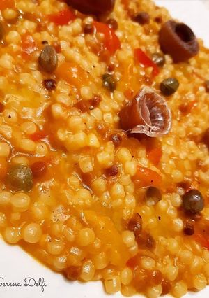 Foto di Fregola peperoni e acciughe