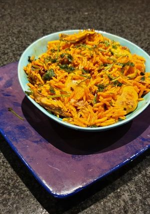 A picture of Pilchards breyani with boiled eggs.
