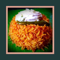A picture of Tomato Coconut Milk Rice.