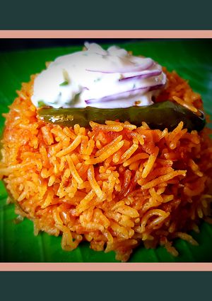 A picture of Tomato Coconut Milk Rice.