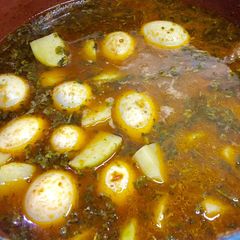 A picture of Alu anday gosht.