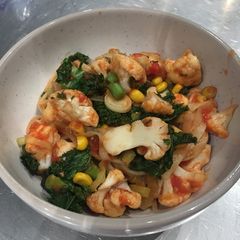 A picture of Tagliatelle with fresh vegetables.