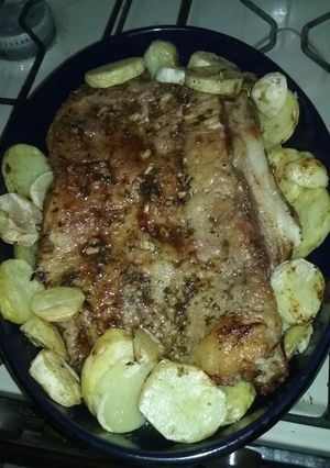 Una foto de Tapa de asado al horno con papas
