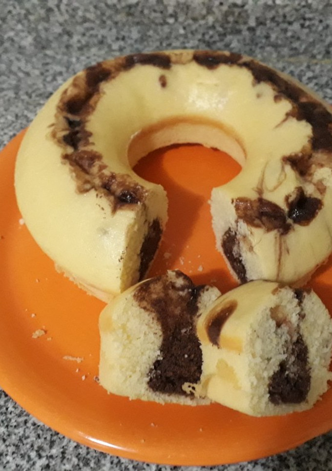 Una foto de 🍋Budín de limón🍋marmolado 🍫😍😋