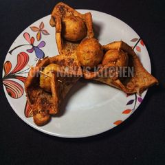 A picture of French toast + yam ball.