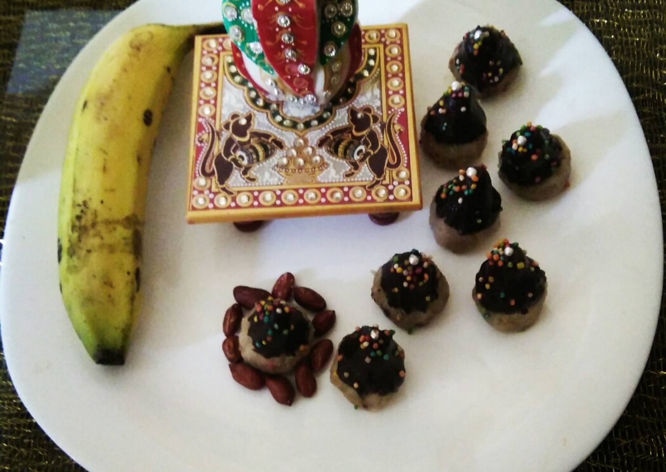 MODAK WITH BANANA & PEANUT DIPPED IN CHOCOlATE
