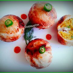 A picture of Bread kachori with leftover daal.