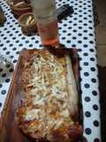 Asado a la parrilla de matambre de chancho gratinado