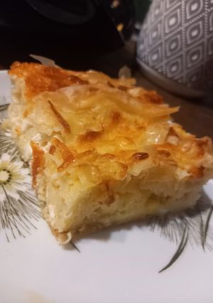 A picture of Quick Crumpled Cheese Pie (Patsavouropita) with Soda.