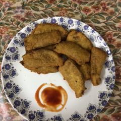 A picture of Brinjal fritters or pakodas.
