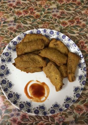 A picture of Brinjal fritters or pakodas.