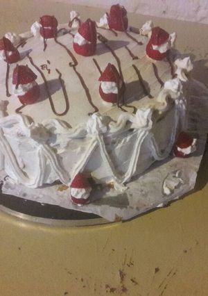 Una foto de Postre de Navidad con relleno de de crema bariloche!