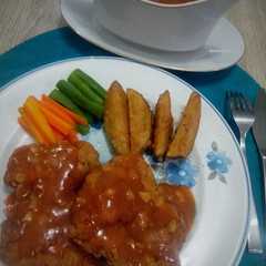 A picture of Chicken steak with barbeque sauce.
