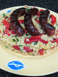 Una foto de Chistorra con arroz integral y pimientos de piquillo- novatos