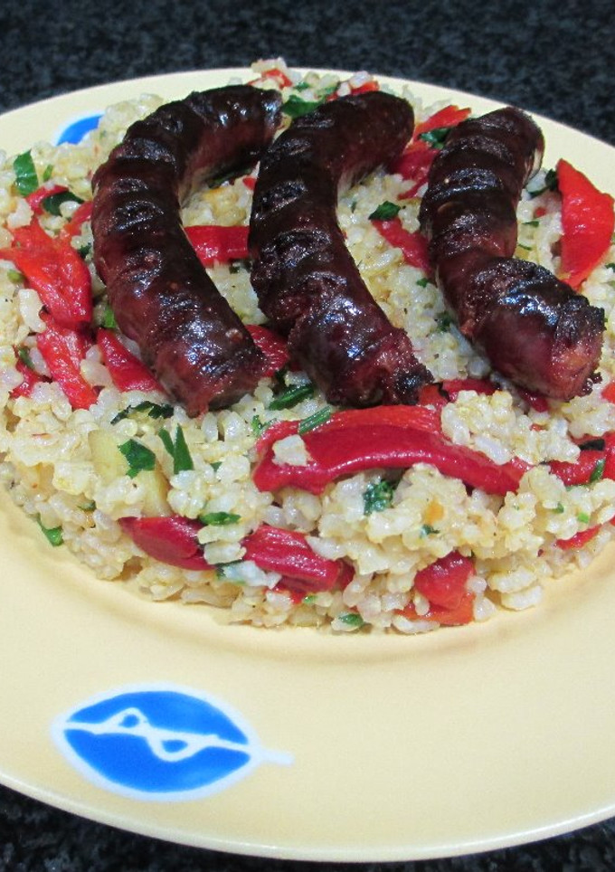 Una foto de Chistorra con arroz integral y pimientos de piquillo- novatos