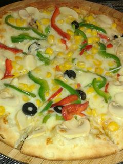 صورة لوصفة بيتزا 🍕