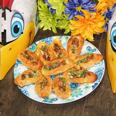 A picture of Omelette Breakfast Mini Croissant Boats.