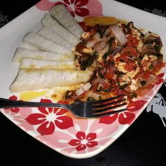 A picture of Boiled  yam and egg sauce.