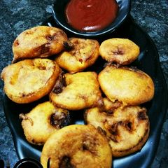 A picture of Tomato ke pakode.