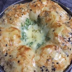 A picture of Buns with spinach cheese dip.