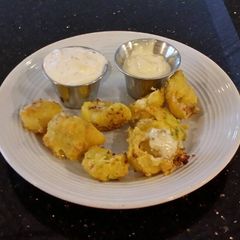A picture of Hushpuppies with Creamy Cheese Centers.