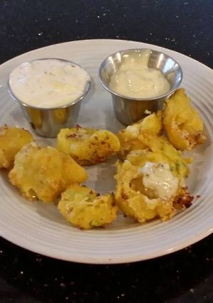A picture of Hushpuppies with Creamy Cheese Centers.