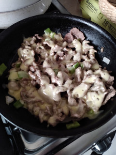 Una foto de Alambre de carne con queso